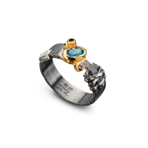 women´s gemstone ring, oxidized, partly gold-plated, light blue Topas