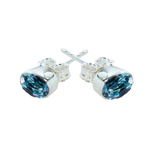 women´s earstuds ice-matted with light blue Zirconia