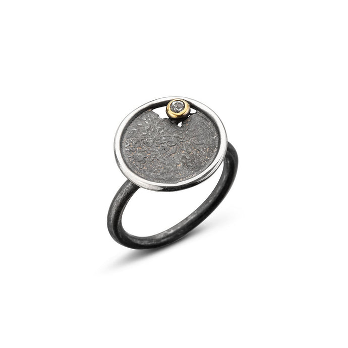 women´s gemstone ring, oxidized, partly gold-plated, white topaz