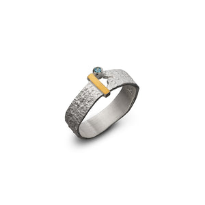women´s gemstonering, silver and gold with light blue Topaz