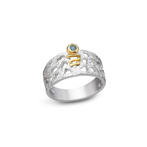 women´s gemstone ring, whitened silver, partly gold-plated, blue topas