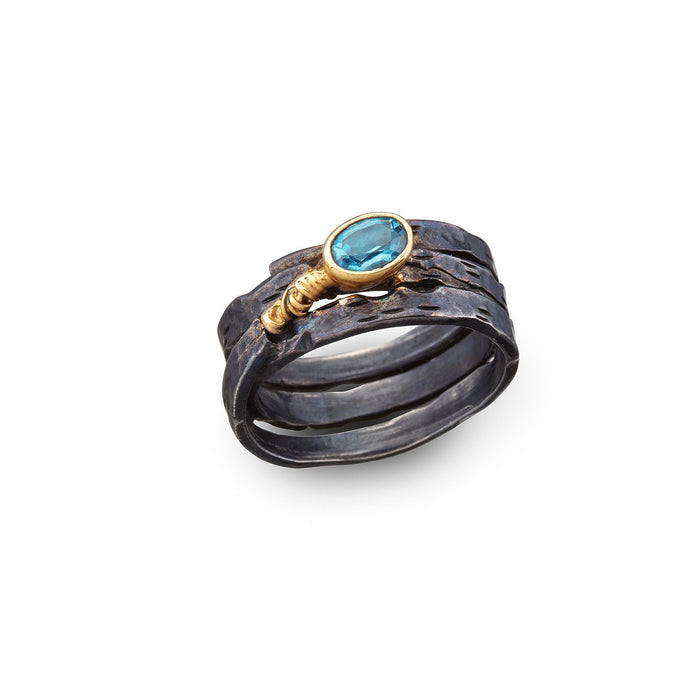 women´s gemstone ring, oxidized silver, partly gold-plated, blue Topaz